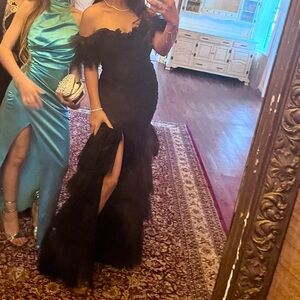 Black off shoulder, super elegant gown.